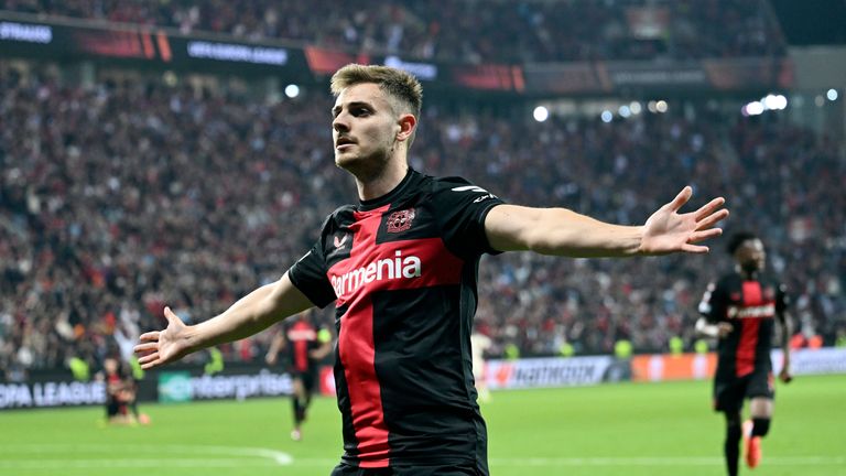 Josip Stanisic celebrates Leverkusen's late equaliser