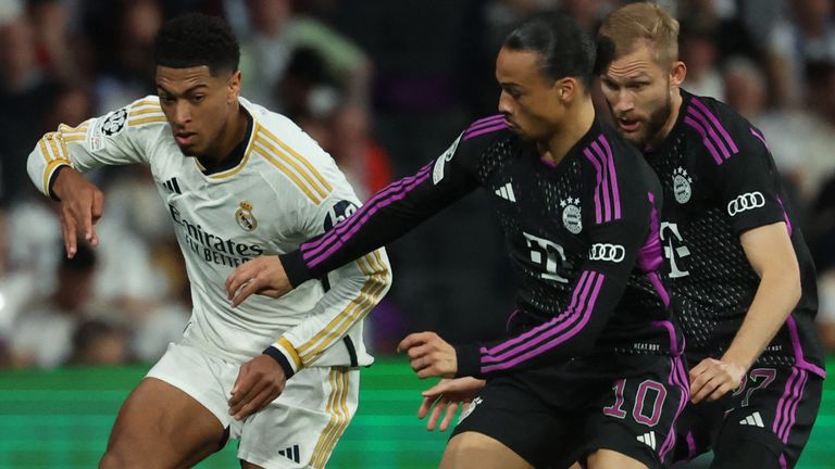 Real Madrid's Jude Bellingham looks to advance against Bayern Munich