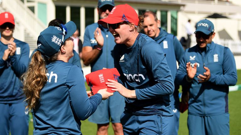 Tammy Beaumont presents Lauren Filer with her debut T20 cap during their series against New Zealand in April