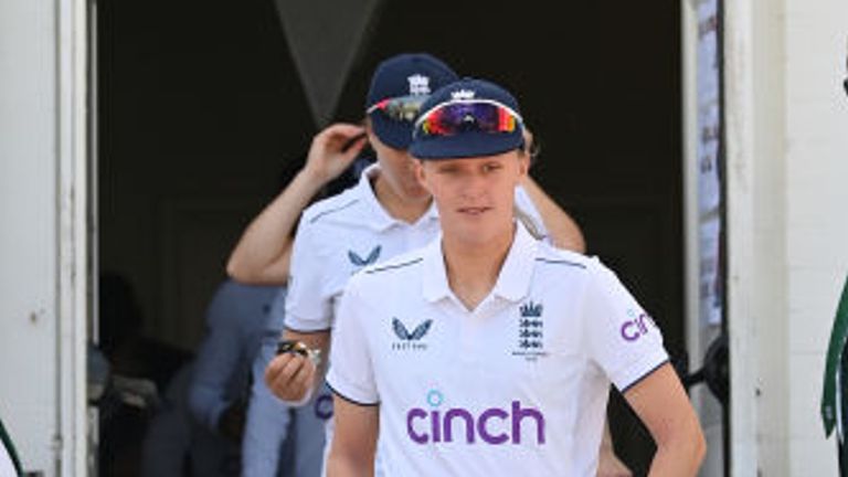 England's pace bowler Lauren Filer leads out the team on day four of the Ashes