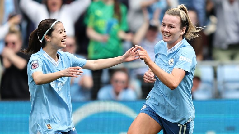 Lauren Hemp celebrates scoring for Man City