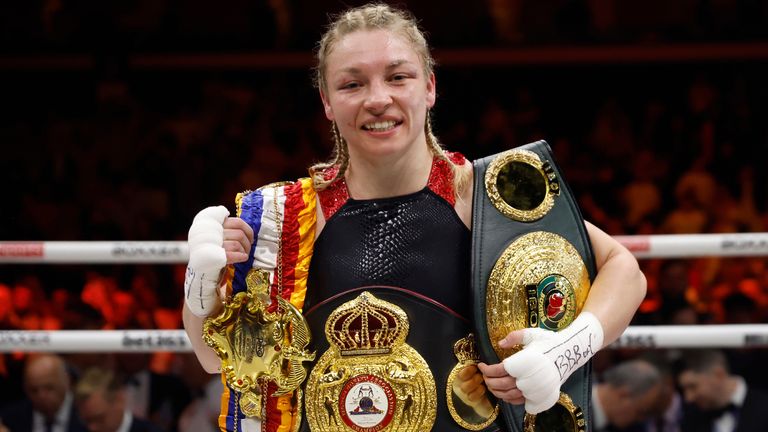 Lauren Price celebrates becoming Wales' first female world boxing champion