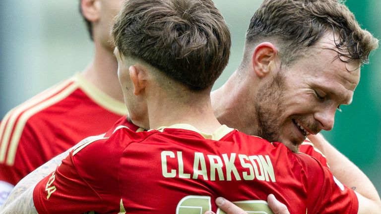 EDINBURGH, SCOTLAND - MAY 12: Aberdeen's Leighton Clarkson celebrates with Nicky Devlin as he scores to make it 1-0 during a cinch Premiership match between Hibernian and Aberdeen at Easter Road Stadium, on May 12, 2024, in Edinburgh, Scotland. (Photo by Ross Parker / SNS Group)