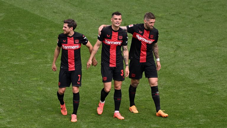 Granit Xhaka celebrates with his team-mates at full-time