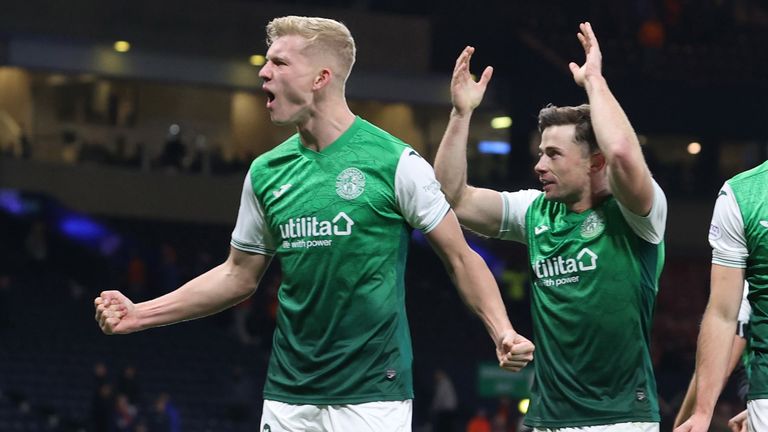 GLASGOW, SCOTLAND - NOVEMBER 21: Hibs' Josh Doig celebrates with Lewis Stevenson at full time  during a Premier Sports Cup semi-final match between Rangers and Hibernian at Hampden Park, on November 21, 2021, in Glasgow, Scotland. (Photo by Alan Harvey / SNS Group)