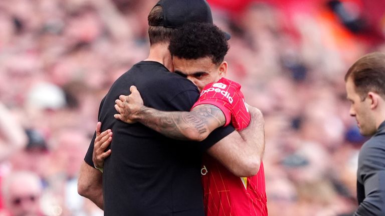 Luis Diaz is hugged by manager Jurgen Klopp after being substituted 