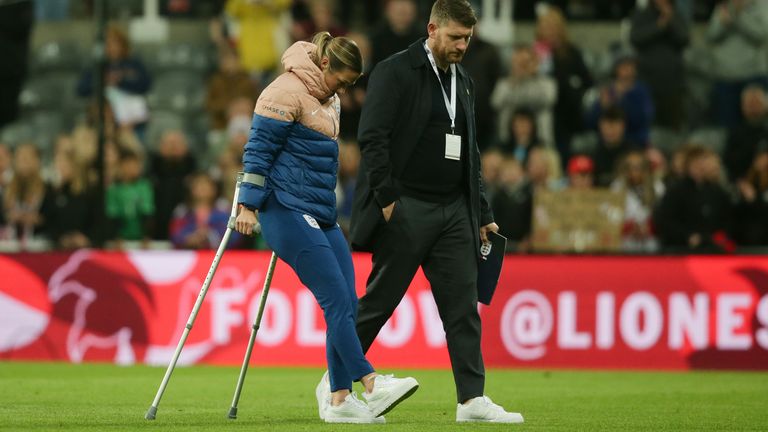 Mary Earps was pictured on crutches after the game, having been forced off inside the opening 10 minutes with a leg injury