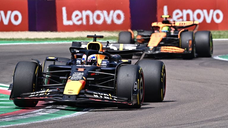 Red Bull Racing's Dutch driver Max Verstappen (L) and McLaren's British driver Lando Norris compete during the Emilia Romagna Formula One Grand Prix at the Autodromo Enzo e Dino Ferrari race track in Imola on May 19, 2024. (Photo by GABRIEL BOUYS / AFP)