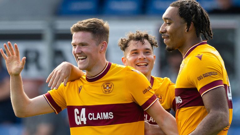 DINGWALL, SCOTLAND - MAY 11: Motherwell's Blair Spittal (L) celebrates scoring to make it 3-1 with teammates Theo Bair (R) and Davor Zdravkovski (C) during a cinch Premiership match between Ross County and Motherwell at the Global Energy Stadium, on May 11, 2024, in Dingwall, Scotland. (Photo by Mark Scates / SNS Group)