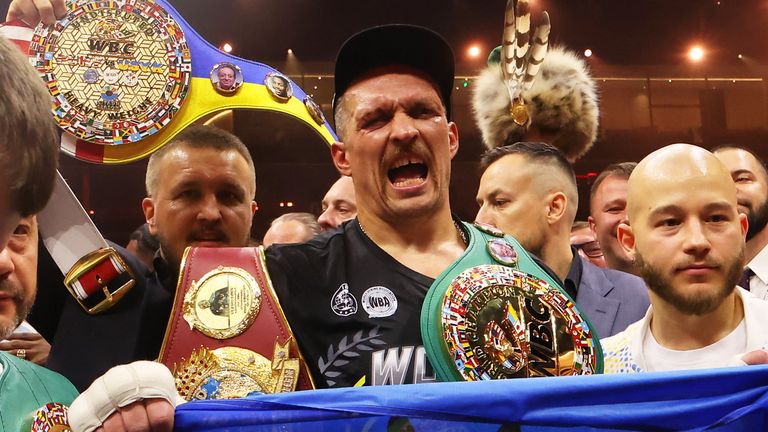 Oleksandr Usyk celebrates after being crowned undisputed world heavyweight champion