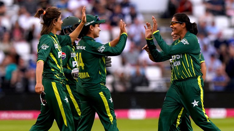 Pakistan's Fatima Sana (centre left) celebrates with team-mates after making the catch to take the wicket of England's Nat Sciver-Brunt during the second women's IT20 match at The County Ground, Northampton. Picture date: Friday May 17, 2024.