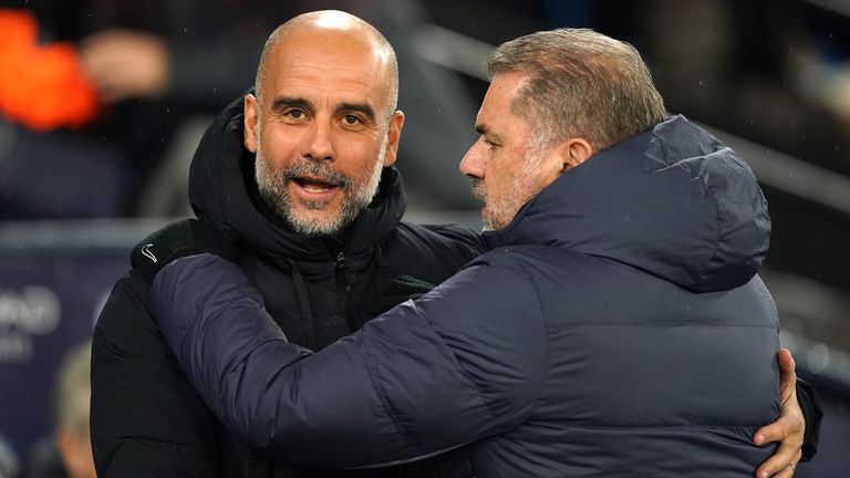 Pep Guardiola and Ange Postecoglou greet each other before the Premier League match at the Etihad Stadium