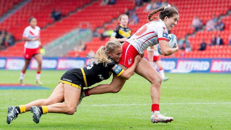 Picture by Allan McKenzie/SWpix.com - 18/05/2024 - Rugby League - Betfred Women's Challenge Cup Semi Final - St Helens v York Valkyrie - Eco-Power Stadium, Doncaster, England - York's Remi Wilton can't stop St Helens Phoebe Hook scoring a try.