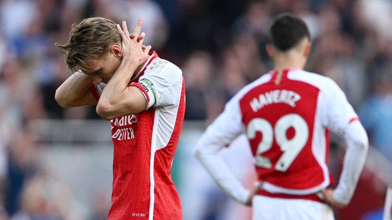 Martin Odegaard cuts a dejected figure as Arsenal fall short in the Premier League title race