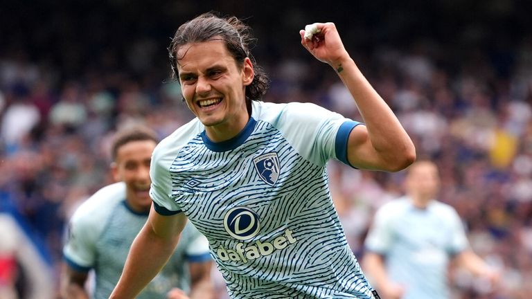 Enes Unal celebrates after pulling a goal back for Bournemouth at Chelsea