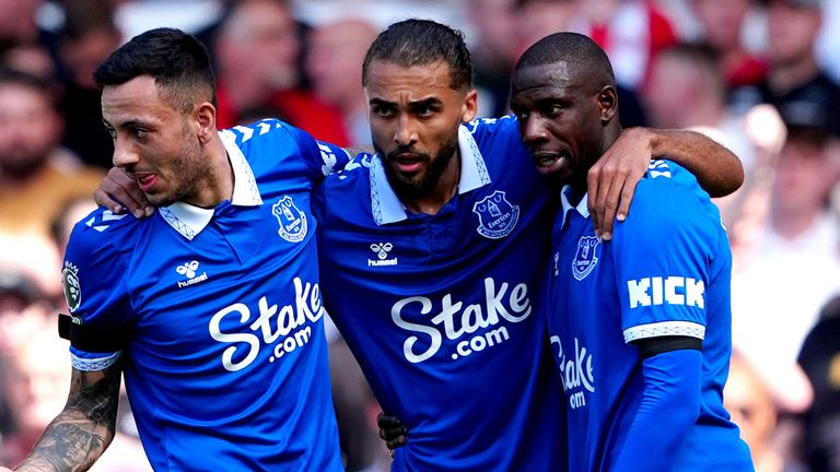 Goalscorer Abdoulaye Doucoure celebrates with team-mates Dominic Calvert-Lewin and Dwight McNeil