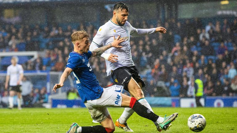 GLASGOW, SCOTLAND - MAY 14: Rangers' Ross McCausland scores to make it 2-1 during a cinch Premiership match between Rangers and Dundee at Ibrox Stadium, on May 14, 2024, in Glasgow, Scotland.  (Photo by Alan Harvey / SNS Group)
