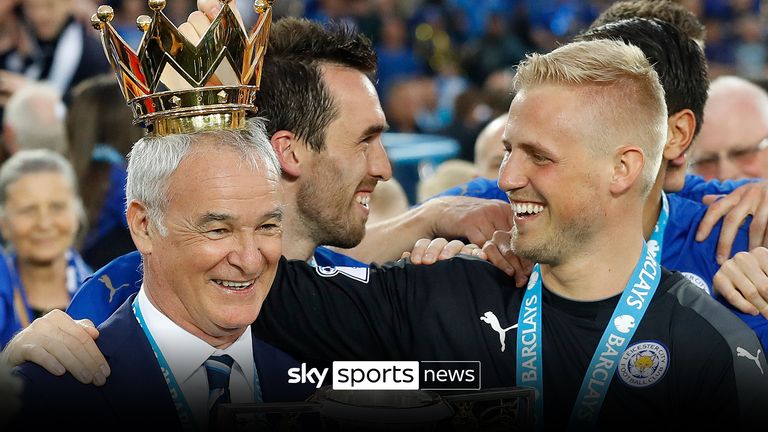 In this May 7, 2016 file photo, Leicester&#39;s team manager Claudio Ranieri gets a crown by Leicester&#39;s goalkeeper Kasper Schmeichel as they lift the trophy as Leicester City celebrate becoming the English Premier League soccer champions at King Power stadium in Leicester, England. Claudio Ranieri loves a challenge and his latest job at Sampdoria will be anything but straightforward.