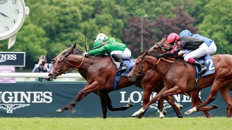 Rouhiya wins  Emirates Poule d'Essai des Pouliches Gr.1  at ParisLongchamp