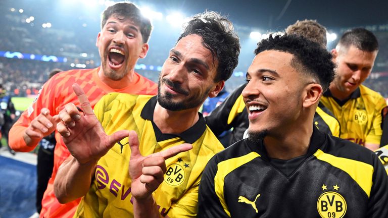 Mats Hummels and Jadon Sancho celebrate reaching the Champions League final