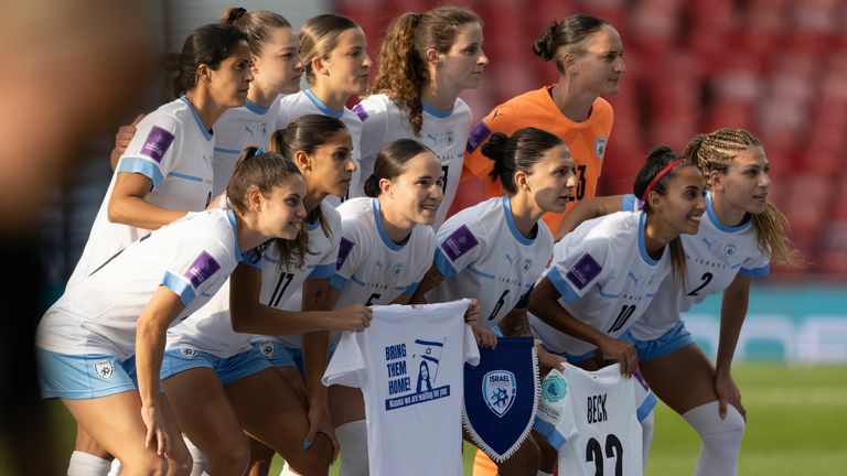 Israel players held up a 'Bring Them Home' t-shirt with a picture of hostage Naama Levy