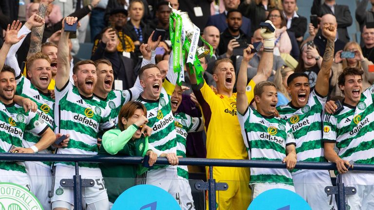 Callum McGregor and Joe Hart lift the Scottish Cup following Celtic's 1-0 win over Rangers
