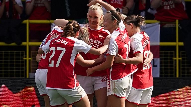 Arsenal's Stina Blackstenius celebrates with team-mates after scoring their side's second goal of the game