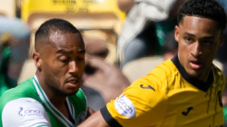 LIVINGSTON, SCOTLAND - MAY 19: Livingston's Tete Yengi (R) and Hibernian's Jordan Obita in action during a cinch Premiership match between Livingston and Hibernian at the Tony Macaroni Arena, on May 19, 2024, in Livingston, Scotland.  (Photo by Mark Scates / SNS Group)