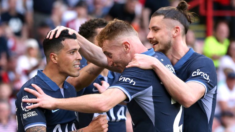 Tottenham Hotspur's Pedro Porro (left) celebrates scoring their side's second goal of the game with team-mates during the Premier League match at Bramall Lane, Sheffield. Picture date: Sunday May 19, 2024.