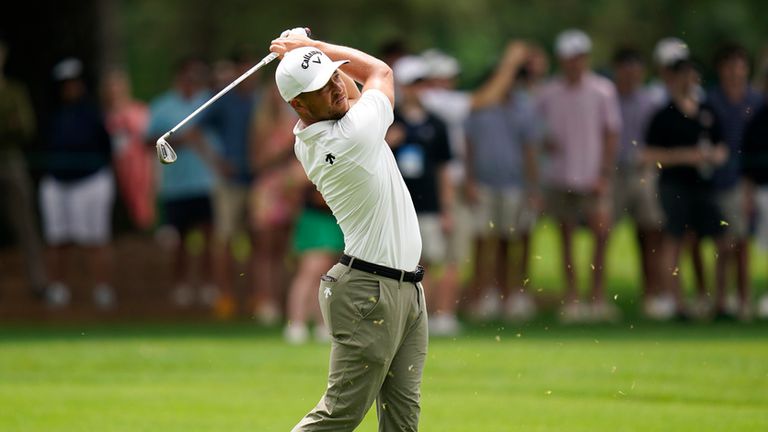 Xander Schauffele hits from the fairway on the third hole during the second round of the Wells Fargo Championship golf tournament at Quail Hollow Friday, May 10, 2024, in Charlotte, N.C. (AP Photo/Erik Verduzco)