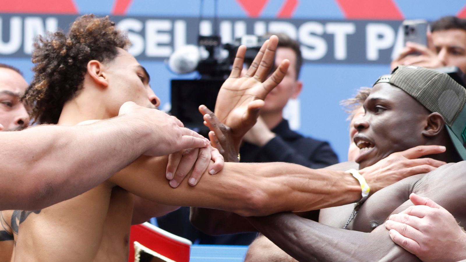 Ben Whittaker shoves opponent as Chris Billam-Smith and Richard Riakporhe refuse to back down at weigh-in