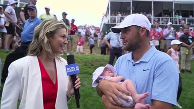 Scheffler brings his new baby to winner's interview!