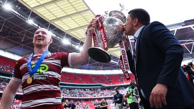 Wigan captain Liam Farrell and head coach Matt Peet celebrate with the Challenge Cup