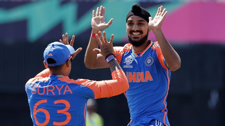 India's Arshdeep Singh, right, celebrates with teammate Suryakumar Yadav after the dismissal of United States' Shayan Jahangir during the ICC Men's T20 World Cup cricket match between United States and India at the Nassau County International Cricket Stadium in Westbury, New York, Wednesday, June 12, 2024. (AP Photo/Adam Hunger)