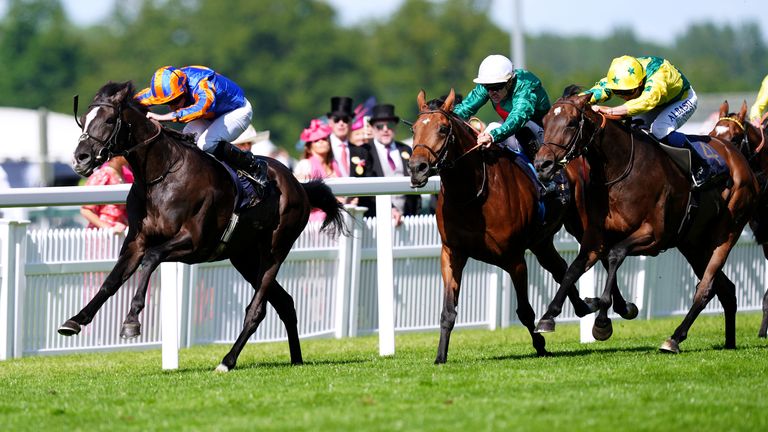 Auguste Rodin ridden by jockey Ryan Moore on their way to winning the Prince Of Wales's Stakes during day two of Royal Ascot 