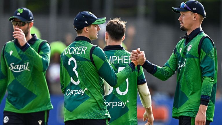 Dublin , Ireland - 14 May 2024; Ireland players including Lorcan Tucker, 3, and Ben White, right, shake hands after their side's defeat in match three of the Floki Men's T20 International Series between Ireland and Pakistan at Castle Avenue Cricket Ground in Dublin. (Photo By Sam Barnes/Sportsfile via Getty Images)