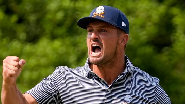 Bryson DeChambeau celebrates after a putt on the eighth hole during the final round of the U.S. Open golf tournament Sunday, June 16, 2024, in Pinehurst, N.C. (AP Photo/Frank Franklin II)
