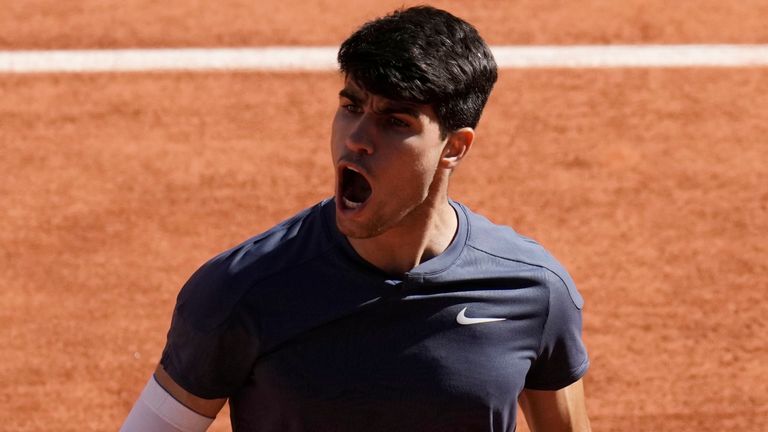 Spain's Carlos Alcaraz reacts during his semifinal match of the French Open tennis tournament against Italy's Jannik Sinner at the Roland Garros stadium in Paris, Friday, June 7, 2024. (AP Photo/Christophe Ena)