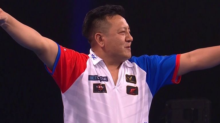 Chinese Taipei celebrate their shock group-stage victory over Republic of Ireland that knocked them out of the World Cup of Darts