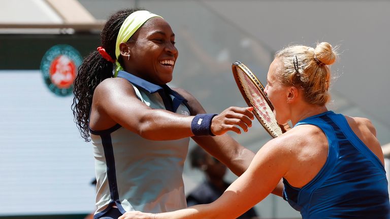 Coco Gauff and Katerina Siniakova rejoice after claiming victory in the French Open women's doubles at Roland Garros (AP Photo/Jean-Francois Badias)
