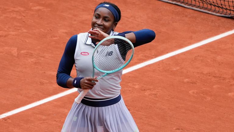 Coco Gauff of the U.S. celebrates winning her fourth round match of the French Open tennis tournament against Italy's Elisabetta Cocciaretto at the Roland Garros stadium in Paris, Sunday, June 2, 2024. (AP Photo/Thibault Camus)