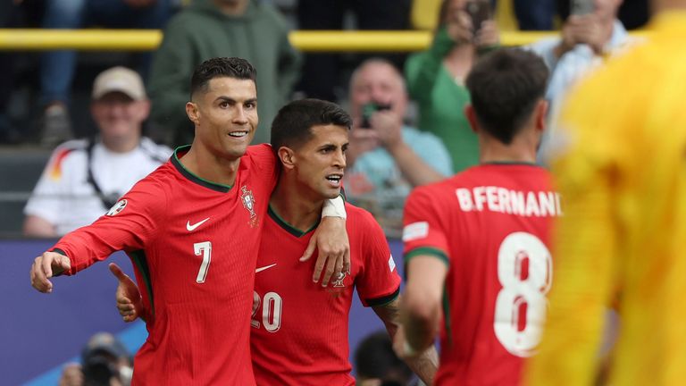 Group F, Matchday 2, Dortmund stadium, Portugal's Bruno Fernandes (r-l) celebrates his goal for 0:3 with Portugal's Joao Cancelo and Portugal's Cristiano Ronaldo. 