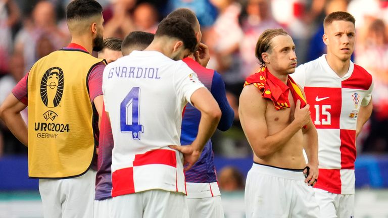 Croatia players gather at the end of a Group B match between Spain and Croatia at the Euro 2024 soccer tournament in Berlin, Germany, Saturday, June 15, 2024. Spain defeated Croatia 3-0. (AP Photo/Manu Fernandez)