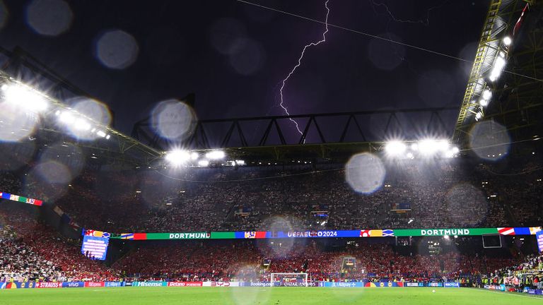 The players were taken off during the first half due to thunderstorms over the stadium