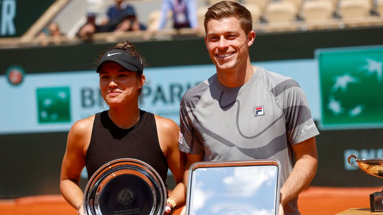 Desirae Krawczyk of the U.S. and Britain's Neal Skupski hold the trophy for second place after losing the mixed doubles final match of the French Open tennis tournament against Germany's Laura Siegemund and France's Edouard Roger-Vasselin at the Roland Garros stadium in Paris, Thursday, June 6, 2024. (AP Photo/Jean-Francois Badias)
