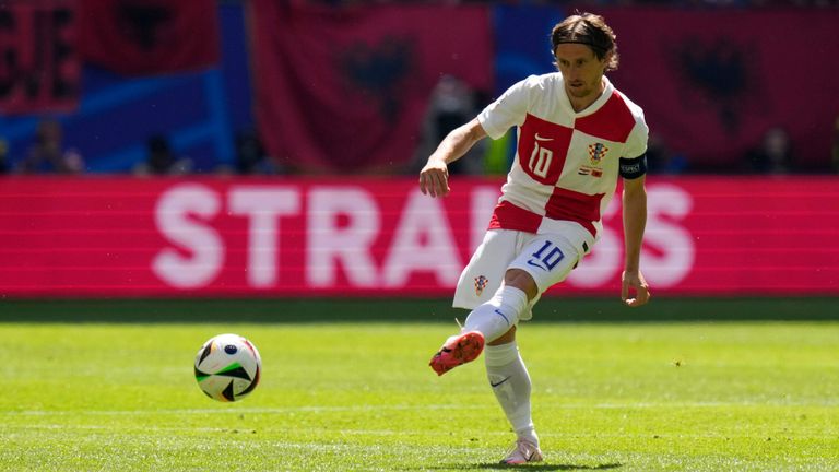 Luka Modric plays a pass in the early stages of Croatia's clash with Albania