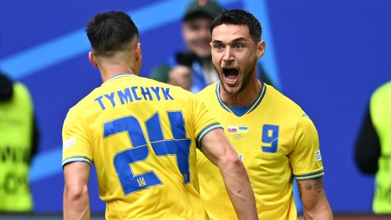 Roman Yaremchuk celebrates after scoring to give Ukraine a 2-1 lead against Slovakia