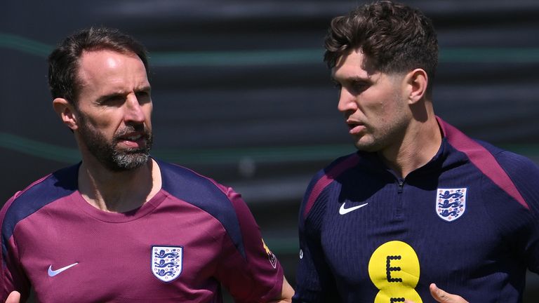 Gareth Southgate (left) has revealed John Stones (right) won't feature for England on Monday. 