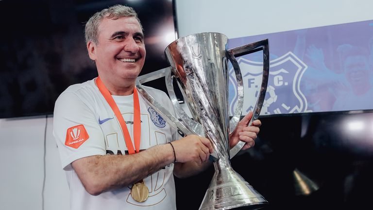 Gheorghe Hagi of Farul Constanta poses with the trophy during the Round 9 of Liga 1 Romania Play-off match between Farul Constanta and FCSB at Gheorghe Hagi Academy Central Stadium on May 21, 2023 in Constanta, Romania. 