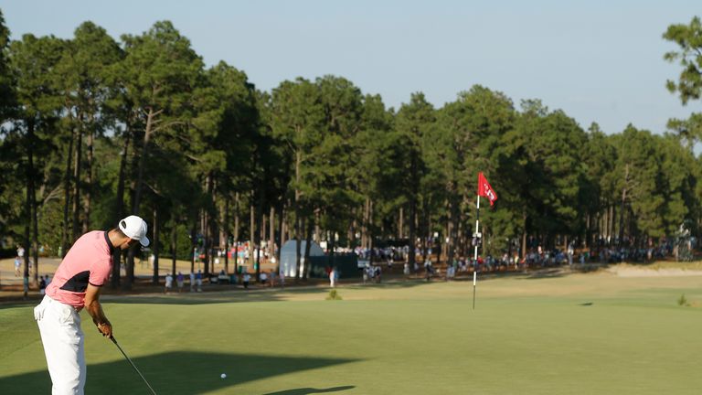 Martin Kaymer, of Germany, putts on the 13th hole during the third round of the U.S. Open golf tournament in Pinehurst, N.C., Saturday, June 14, 2014
